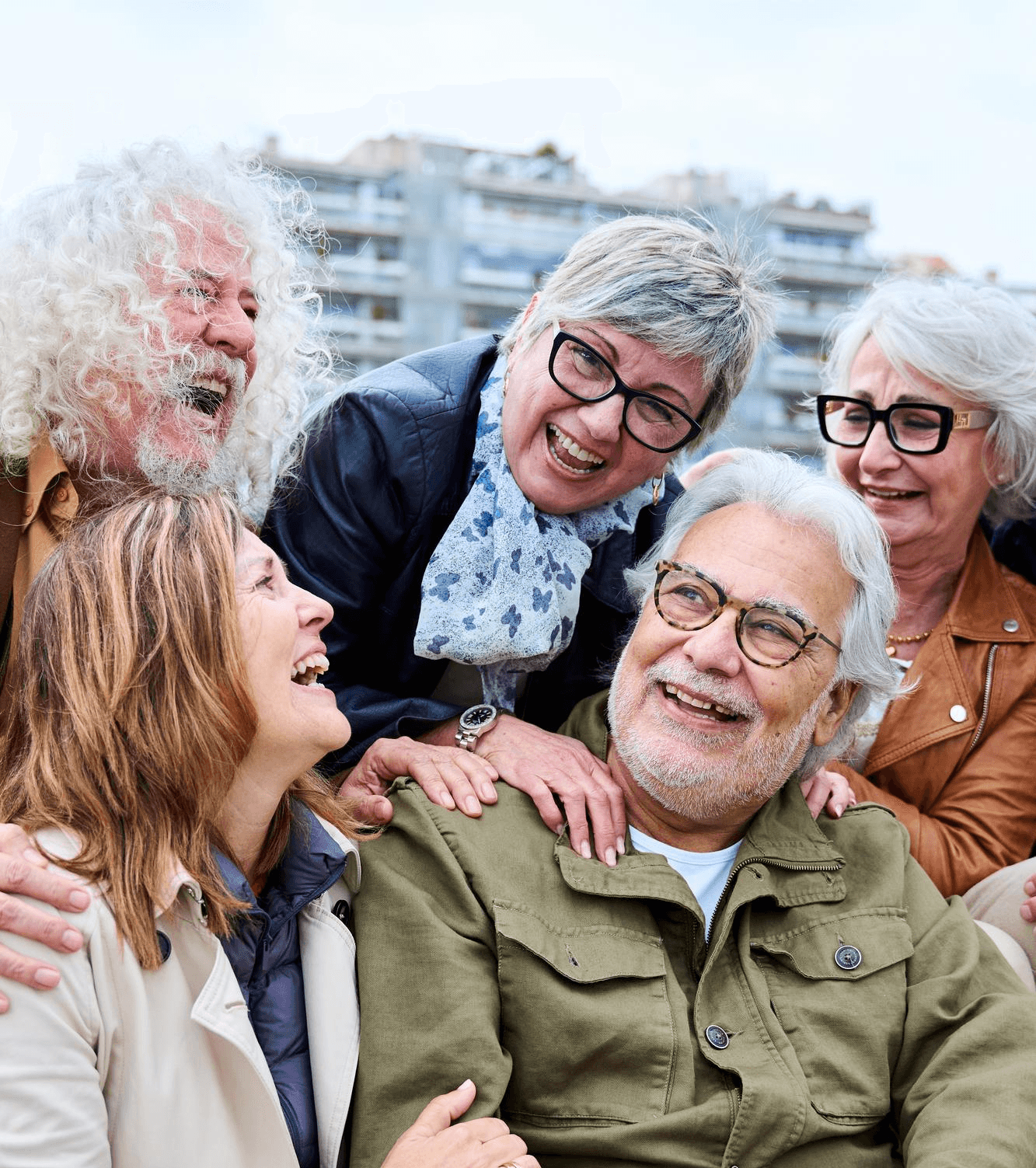 Older adults and family members together outdoors