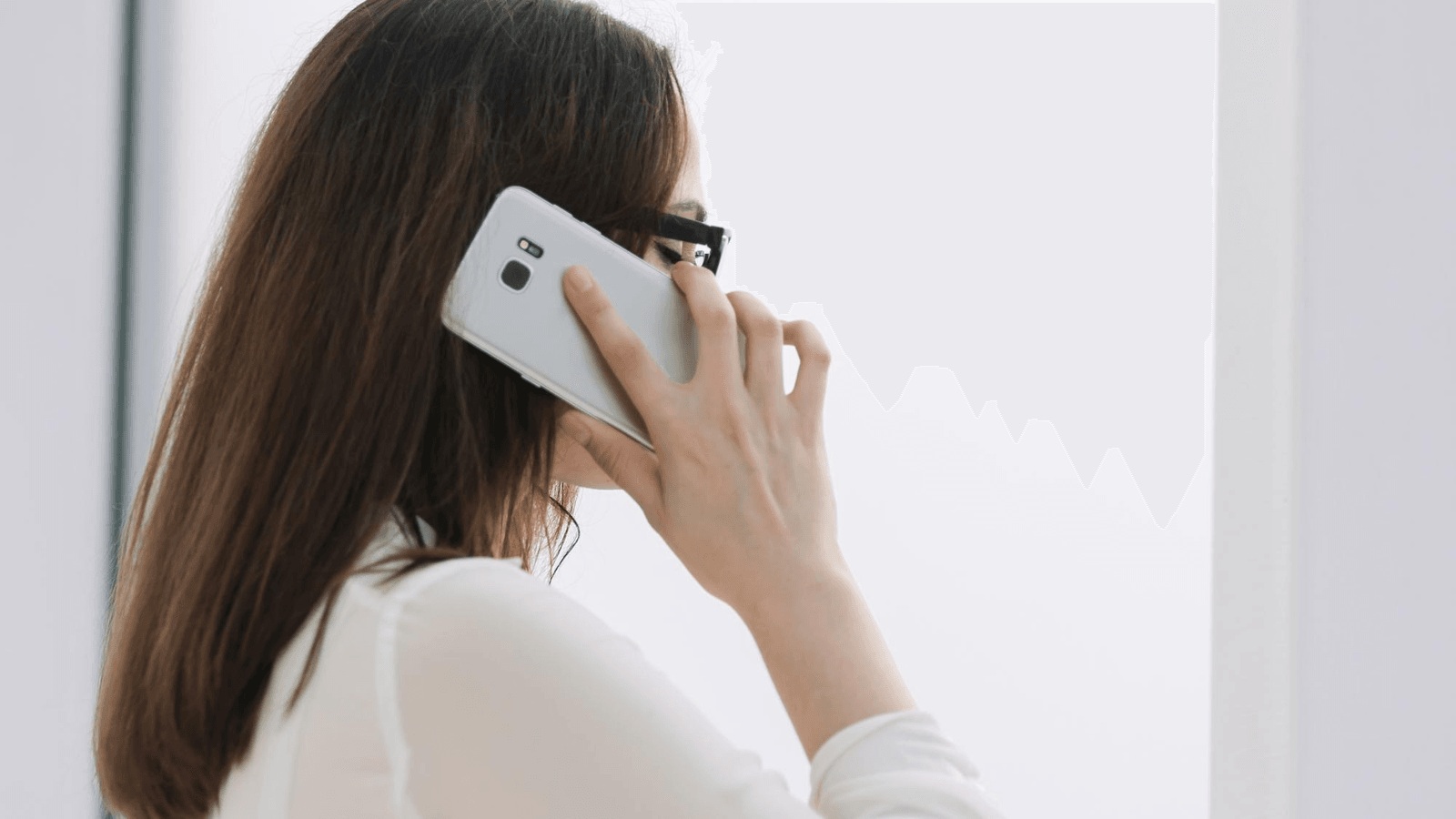 A care coordinator taking a referral call