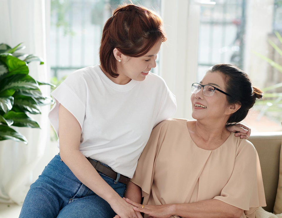 A clinician talking with an older adult patient